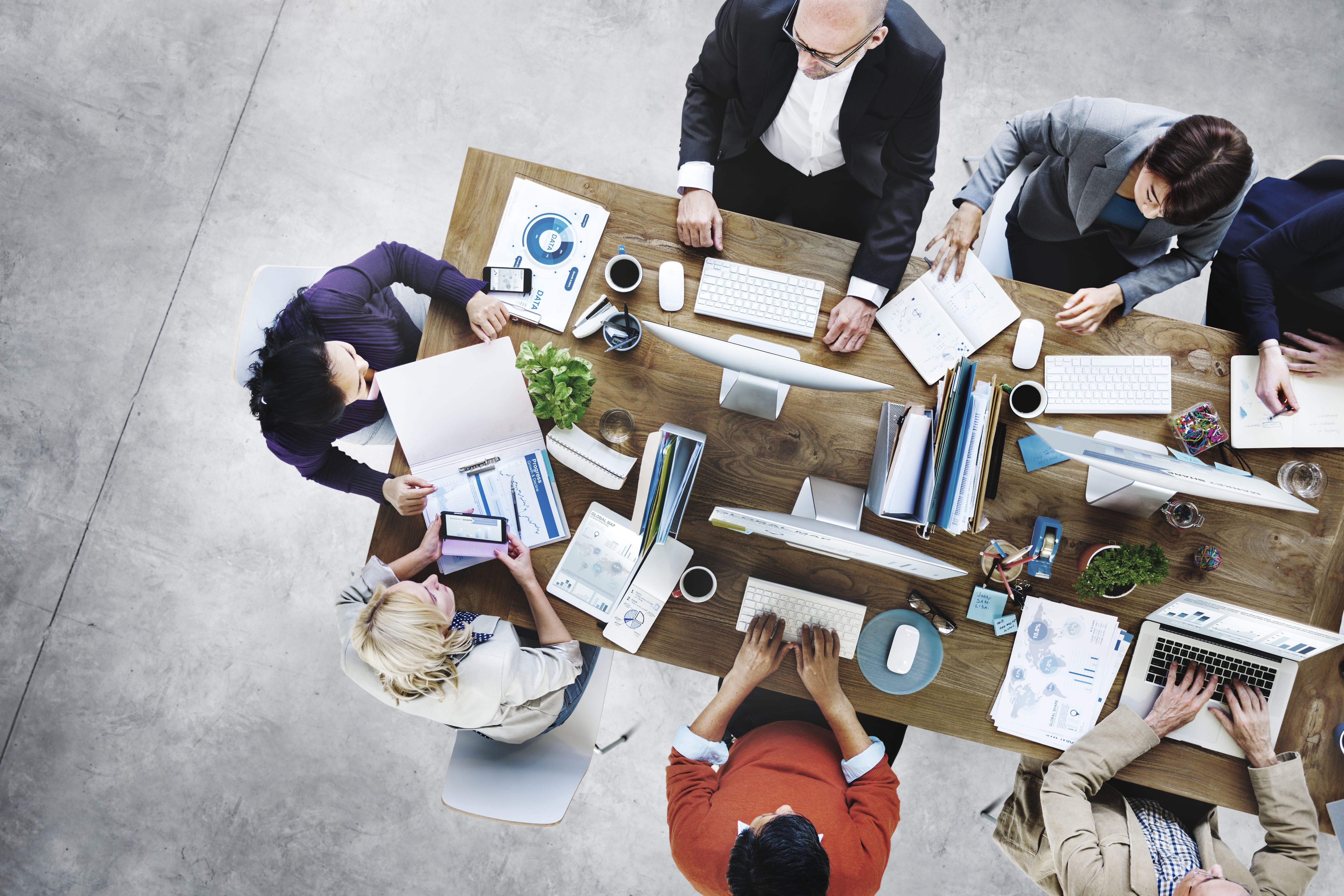 People gathered around a table working